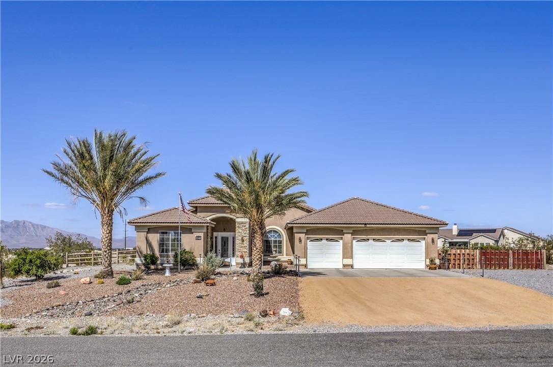 Image 3: This desert oasis features a classic tiled roof an