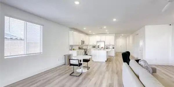 Image 4: Open-concept living area with a spacious layout, m