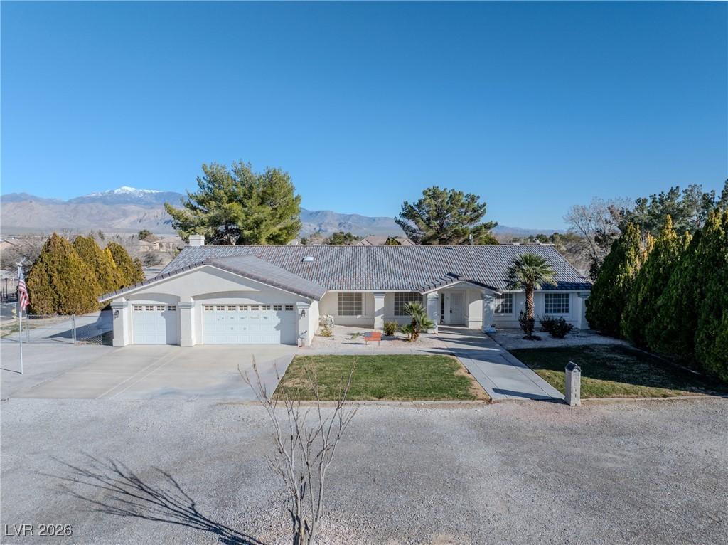 Image 3: Single story home featuring driveway, a garage, a