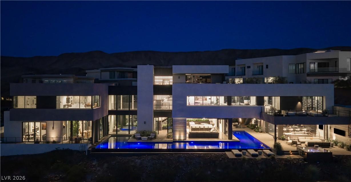 Image 3: A modern architectural marvel, this property boast