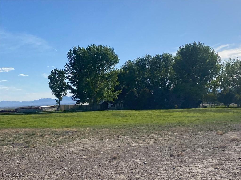 Image 4: View of yard with a view of countryside and a moun
