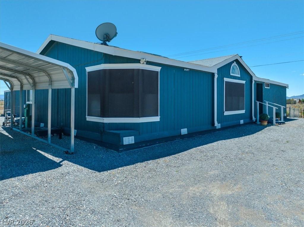Image 2: This charming home offers a spacious layout and co