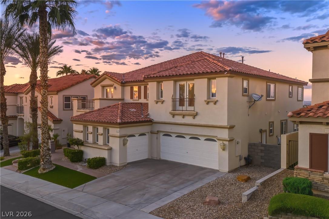 Image 1: This exquisite property presents a cdriveway.