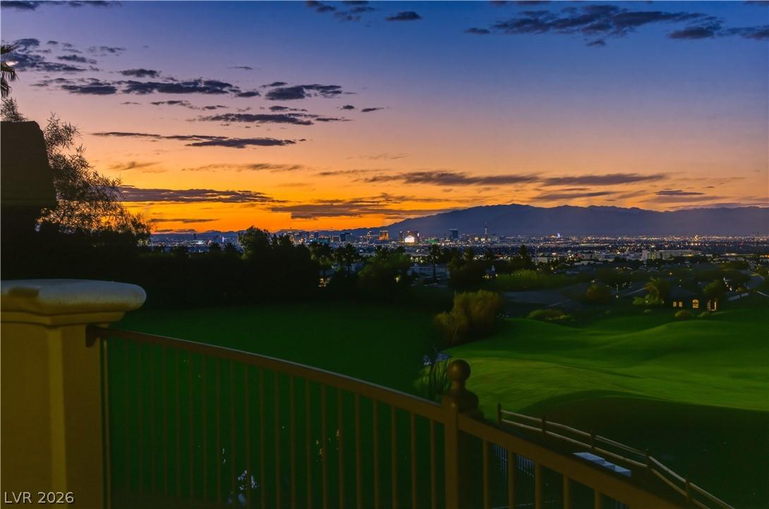 Image 2: This panoramic evening view from the Primary Bedro