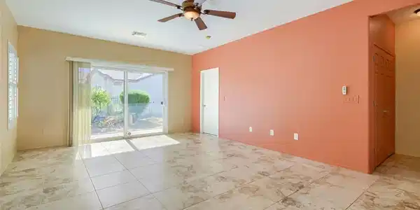 Image 4: Sliding glass doors open directly to the outdoor p