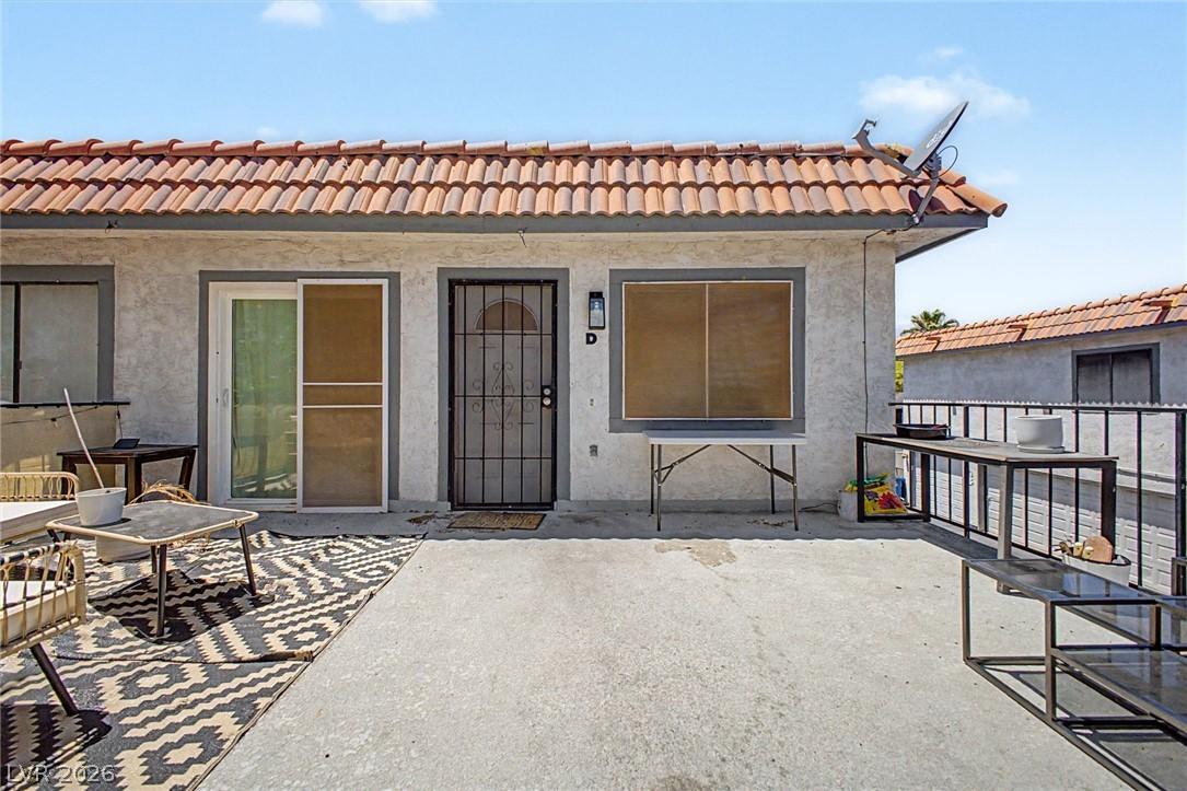 Image 2: This residence features a patio for outdoor enjoym