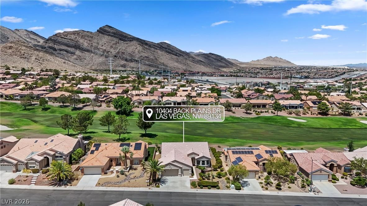 Image 3: An aerial perspective reveals a vibrant neighborho