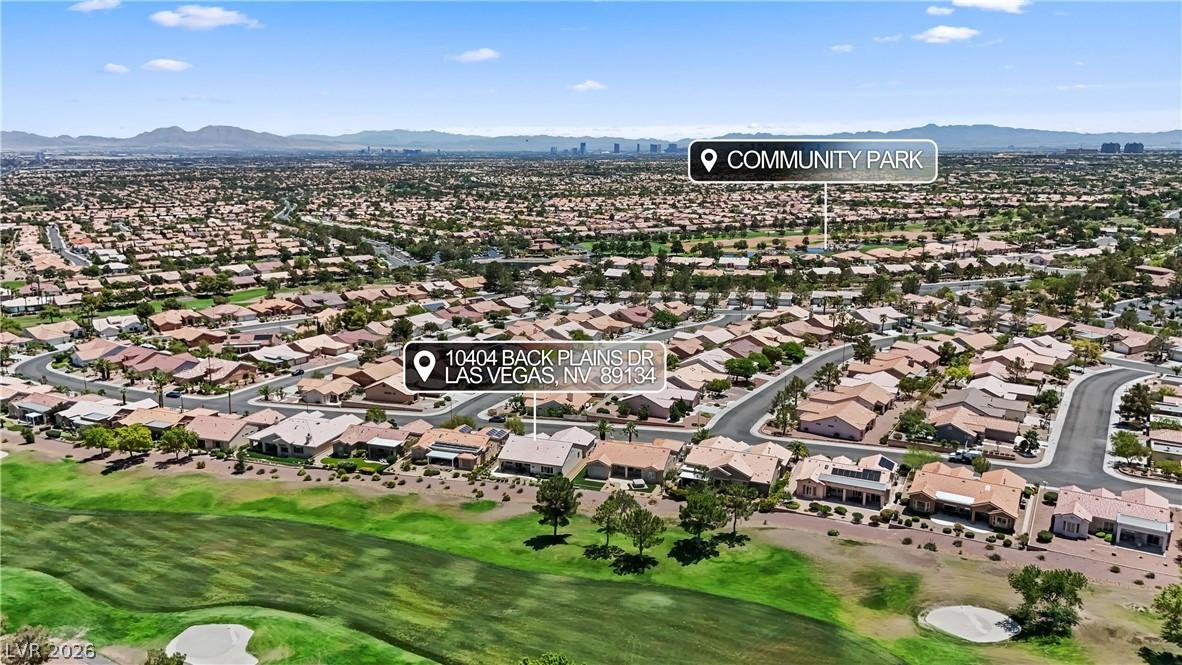 Image 4: An aerial perspective reveals a vibrant neighborho