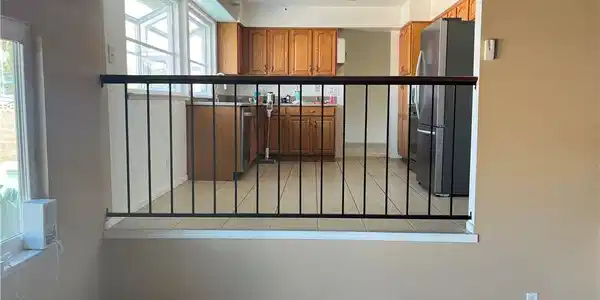 Image 4: View of the eat in kitchen from the family room.