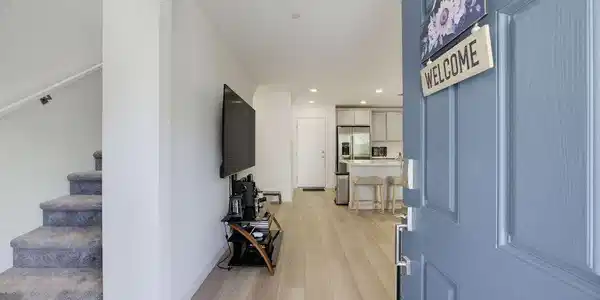 Image 3: Step into a home with seamless transitions, where