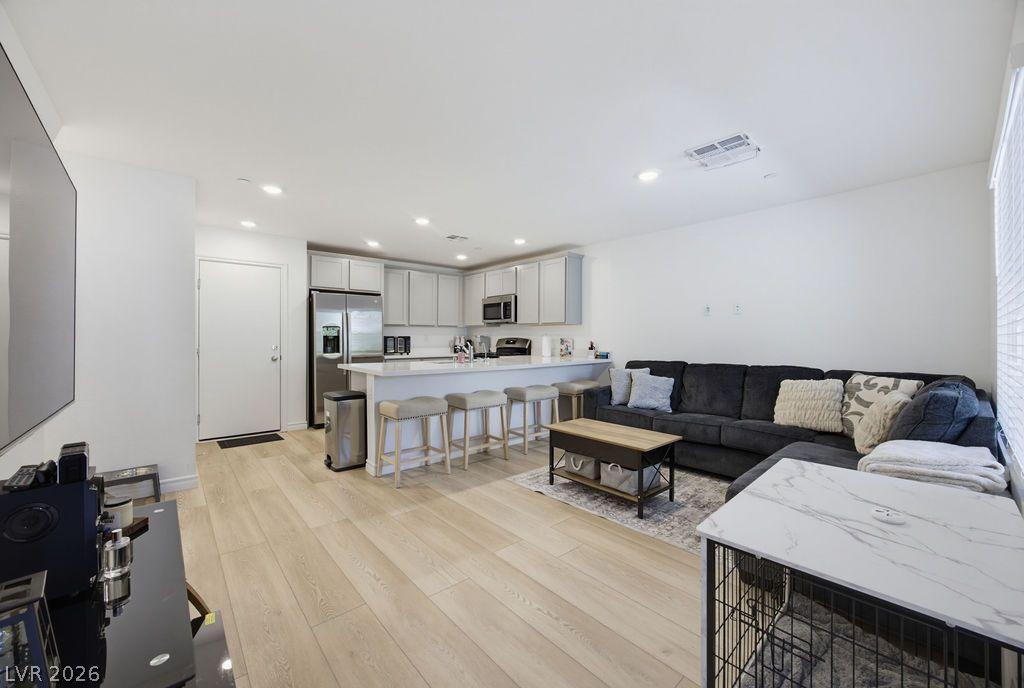 Image 4: An open floorplan seamlessly connects the well-app