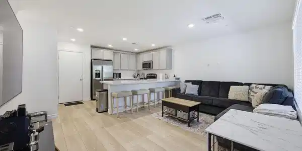 Image 4: An open floorplan seamlessly connects the well-app