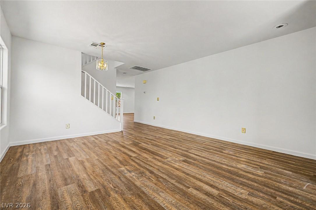 Image 4: An inviting open-plan living space features richly