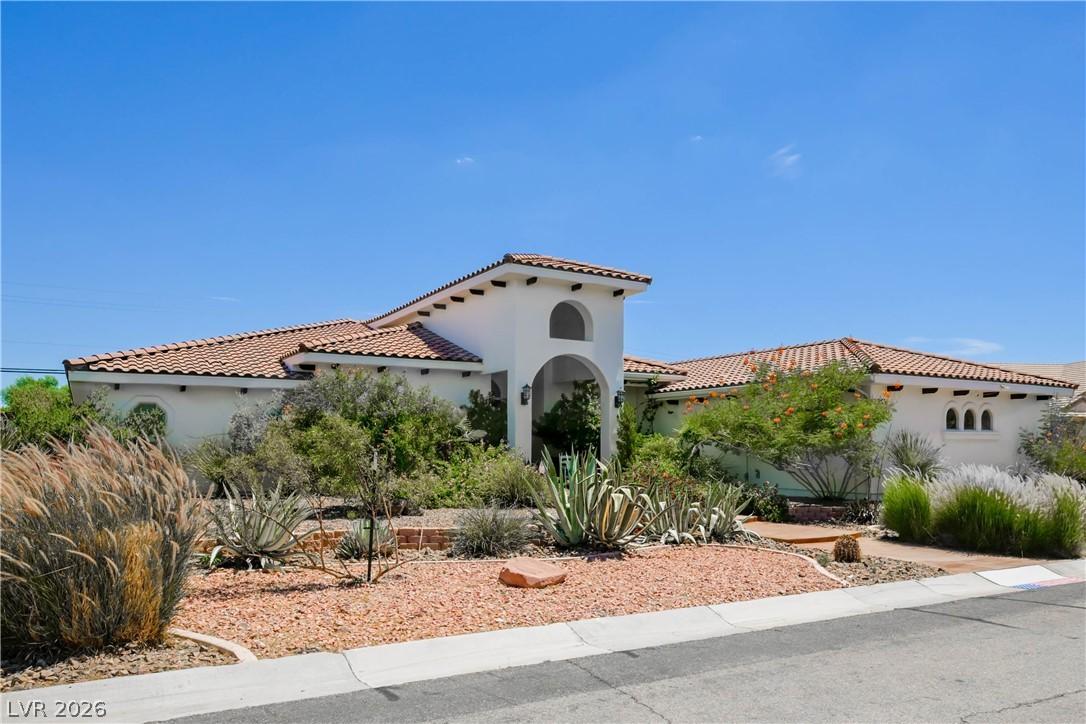 Image 2: Spanish-style architecture with a classic tile roo