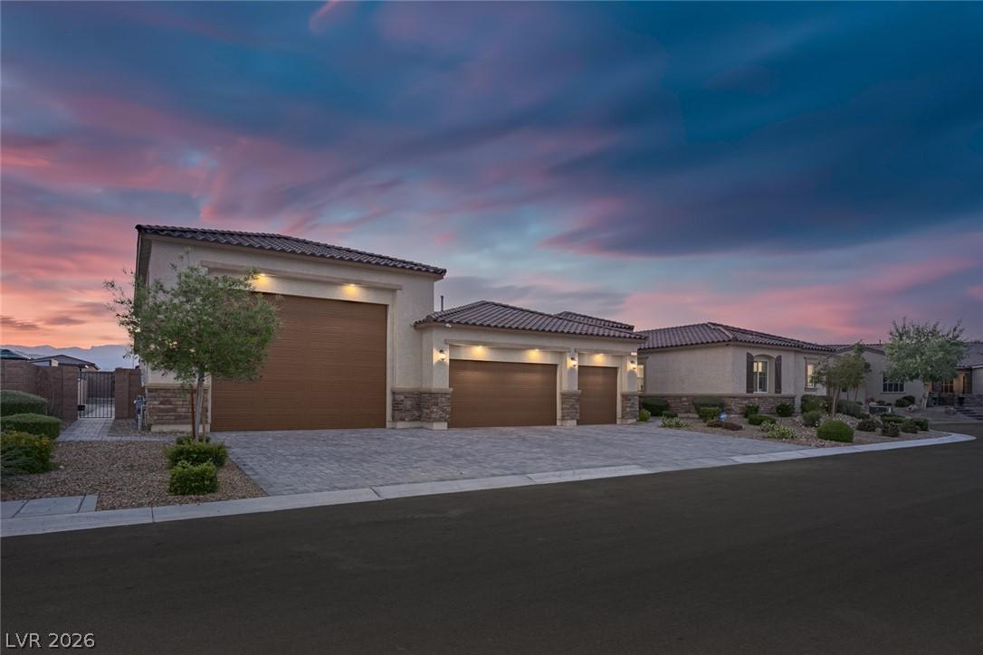 Image 2: A striking exterior presents an inviting entry wit