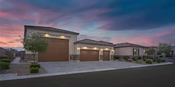 Image 2: A striking exterior presents an inviting entry wit