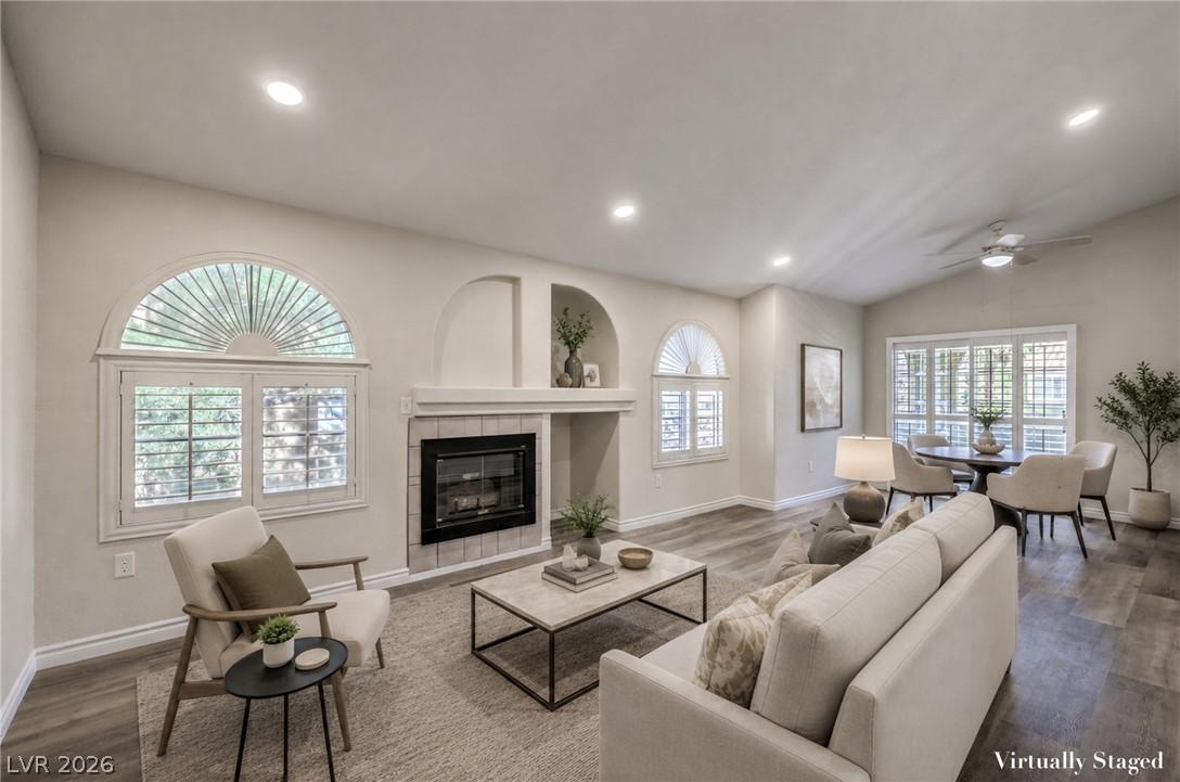 Image 3: Relax in this inviting living space, showcasing a
