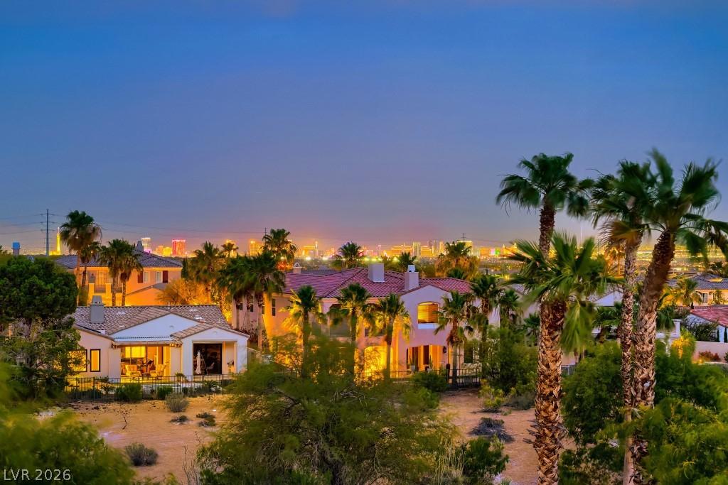 Image 2: Las Vegas Strip lights glimmer on the horizon, pai