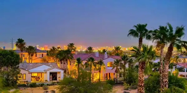 Image 2: Las Vegas Strip lights glimmer on the horizon, pai