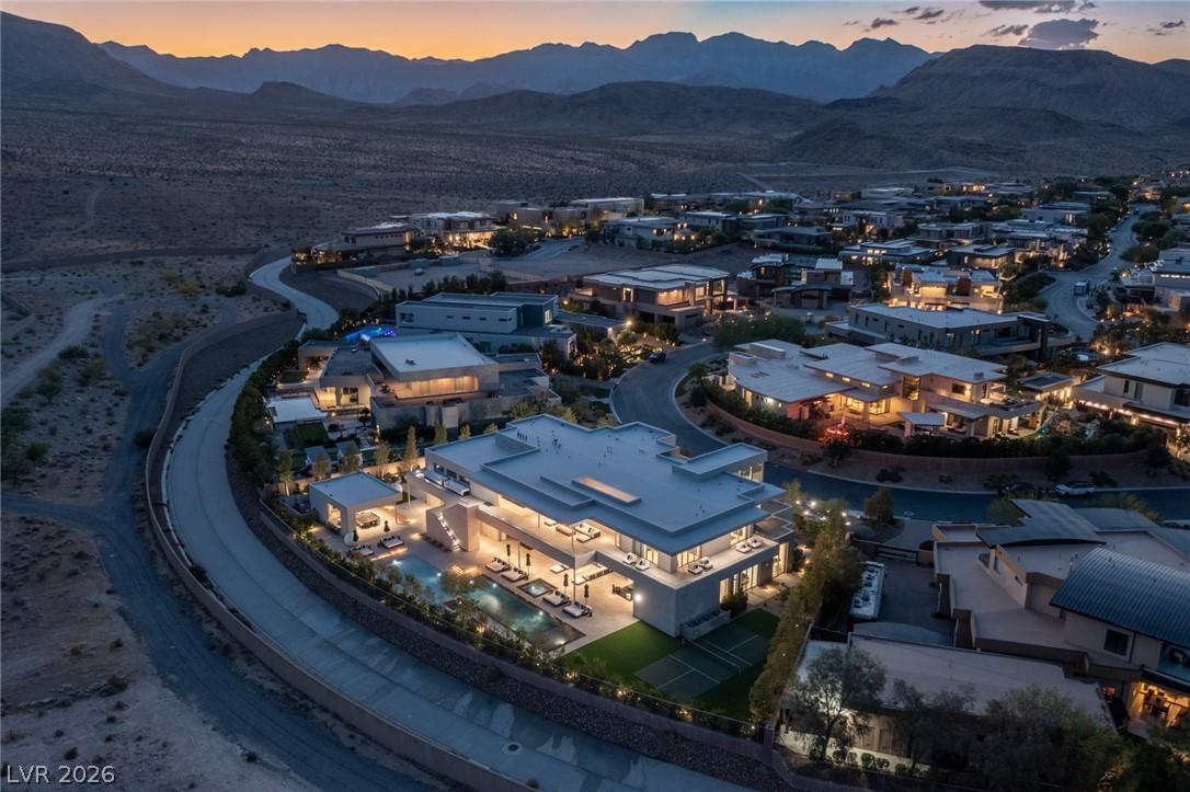 Image 2: An aerial panorama reveals a contemporary desert c