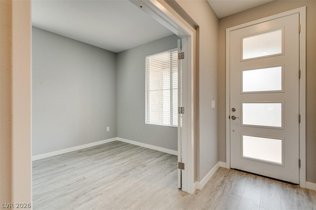 Image 4: An inviting entryway with contemporary door design