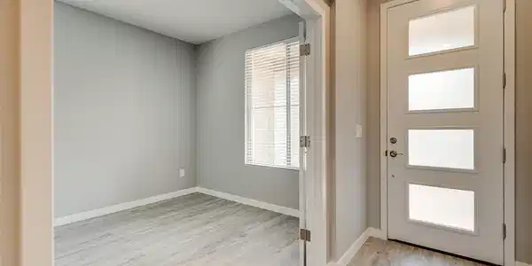 Image 4: An inviting entryway with contemporary door design