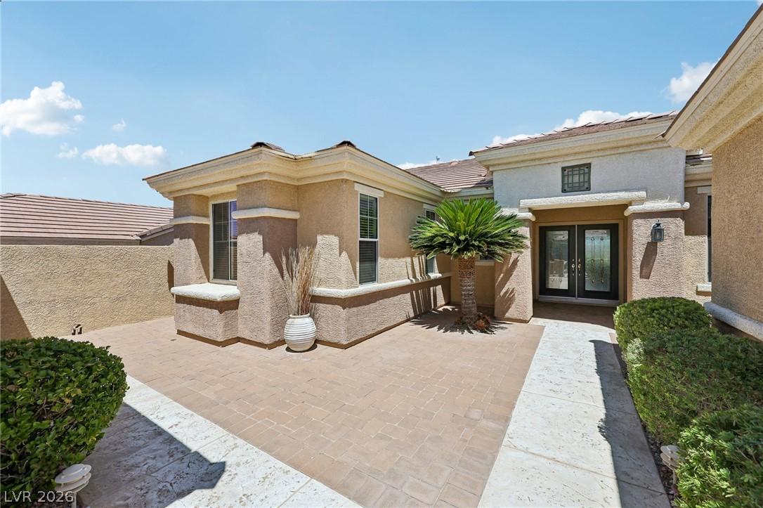 Image 4: A well-maintained paved courtyard provides a welco