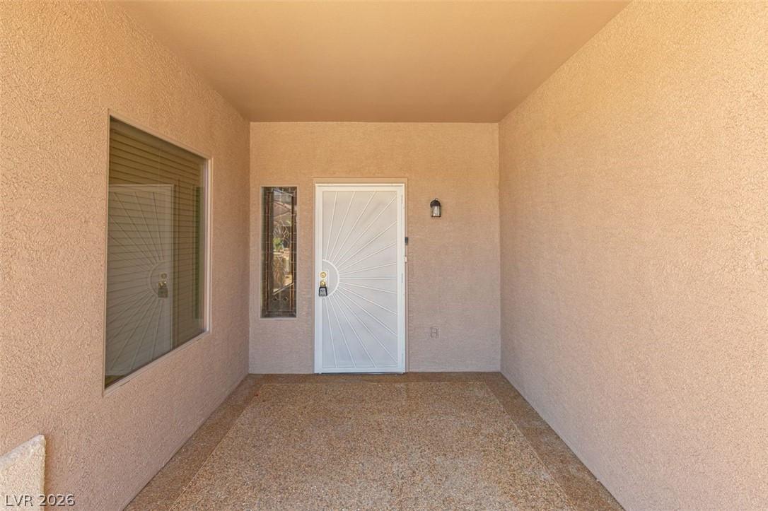 Image 4: Secure entry is provided by a covered porch with a