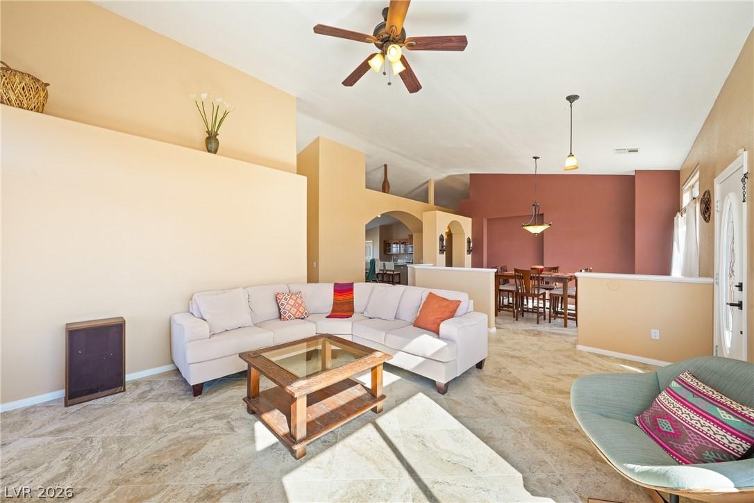 Image 3: This airy living space offers an inviting atmosphe