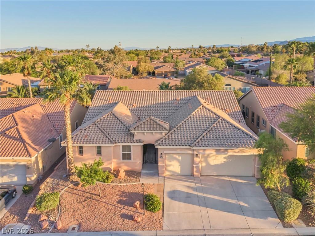 Image 2: An inviting single-family home awaits, featuring a
