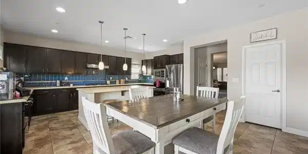 Image 4: Culinary aspirations come alive in this kitchen, f
