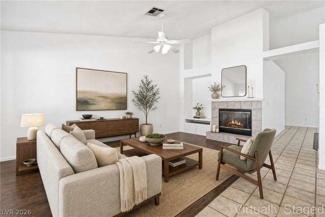 Image 2: **Virtually Staged** 
A comforting fireplace prov
