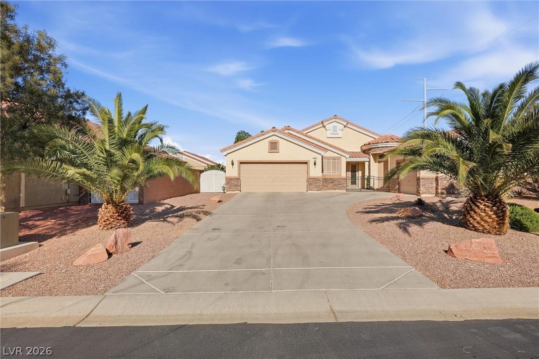 Image 1: This appealing desert-style residence offers a spa