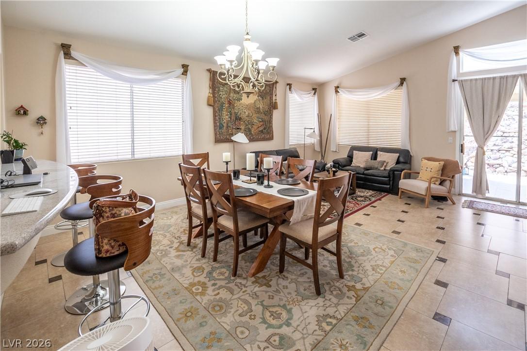 Image 4: An inviting dining area offers a seamless flow int