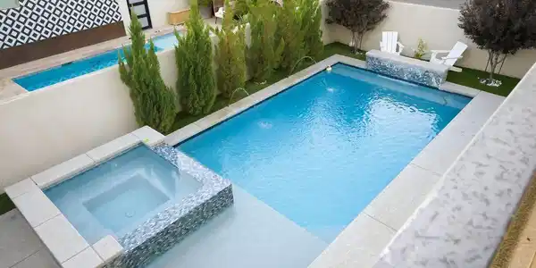 Image 2: Modern architecture with clean lines and a bold en