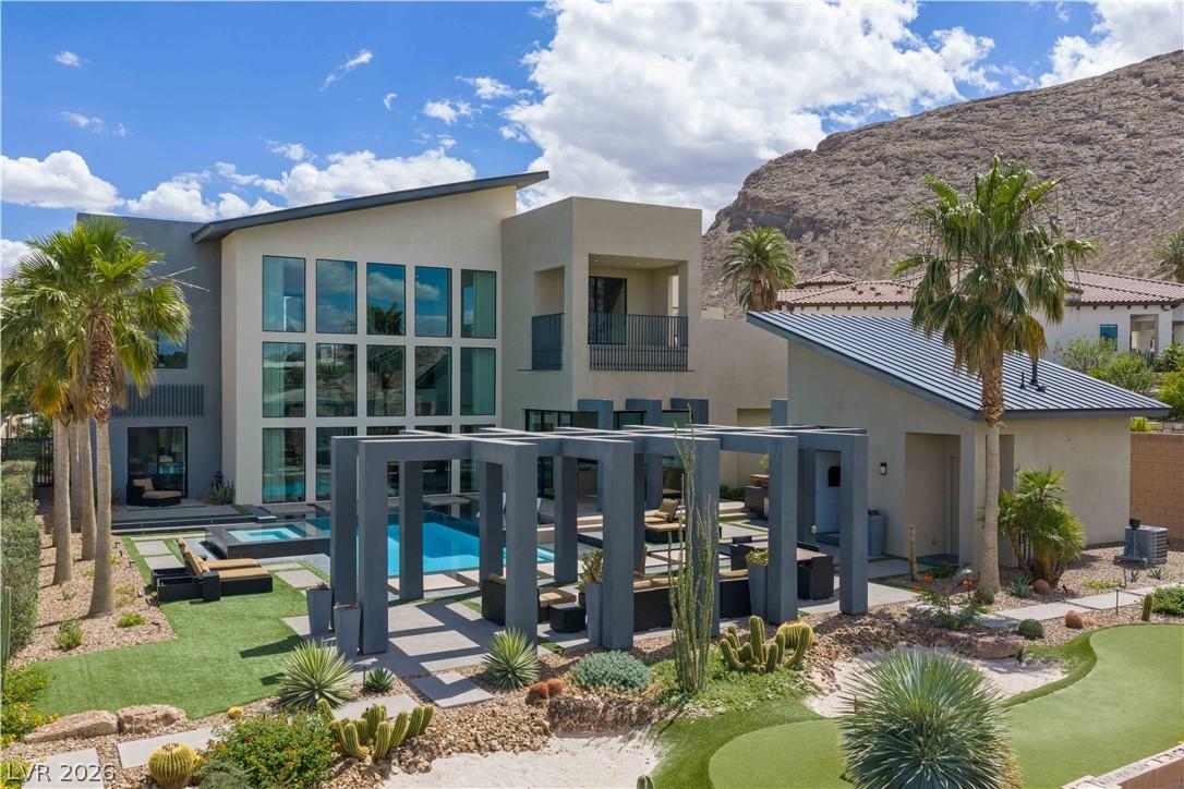 Image 1: A true desert oasis awaits, featuring a sparkling