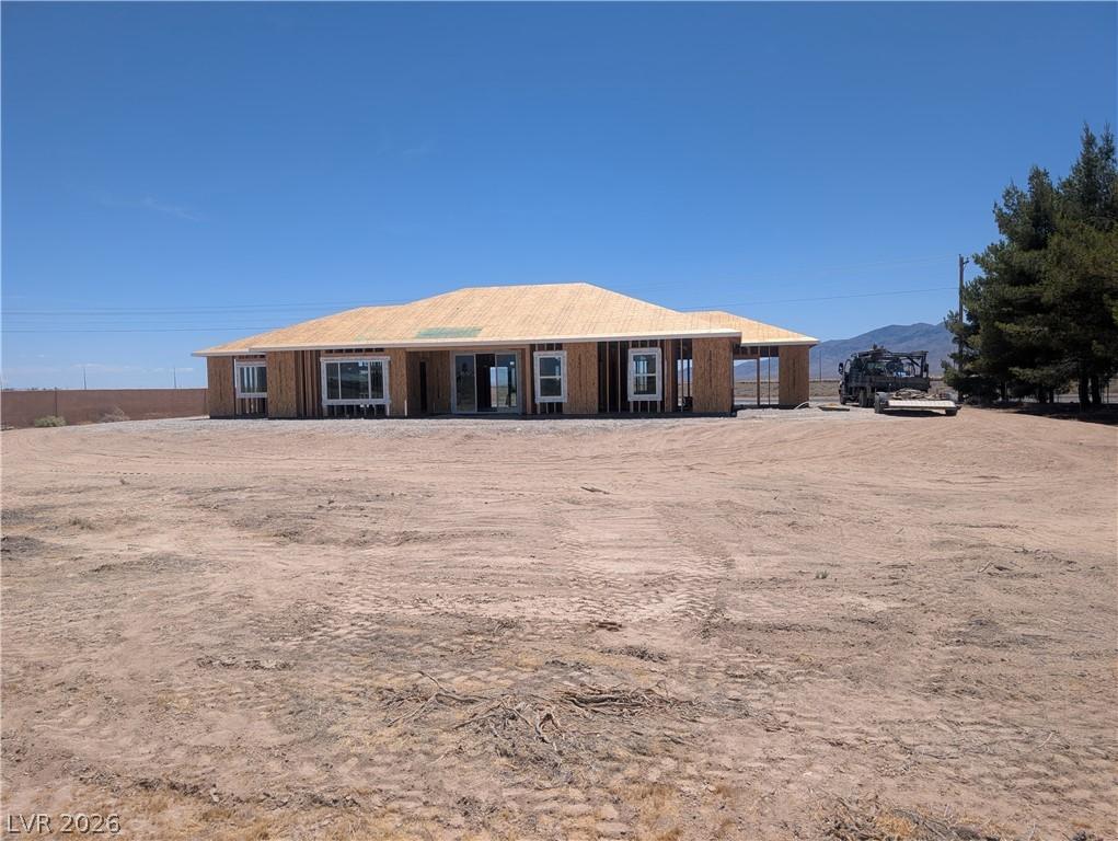 Image 3: A newly framed single-story home awaits its finish