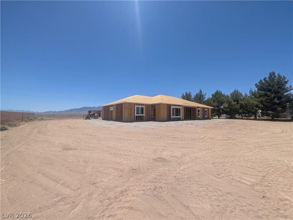 Image 4: A newly framed single-story residence awaits finis