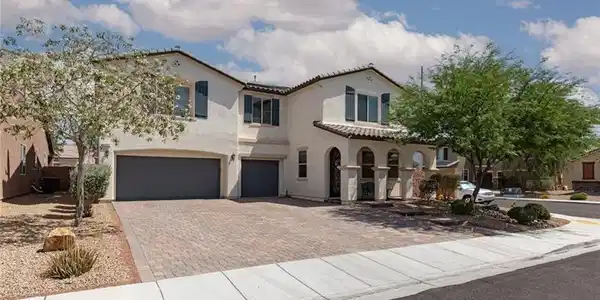 Image 3: This spacious residence boasts a welcoming entranc