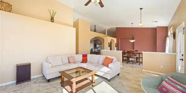 Image 3: This airy living space offers an inviting atmosphe