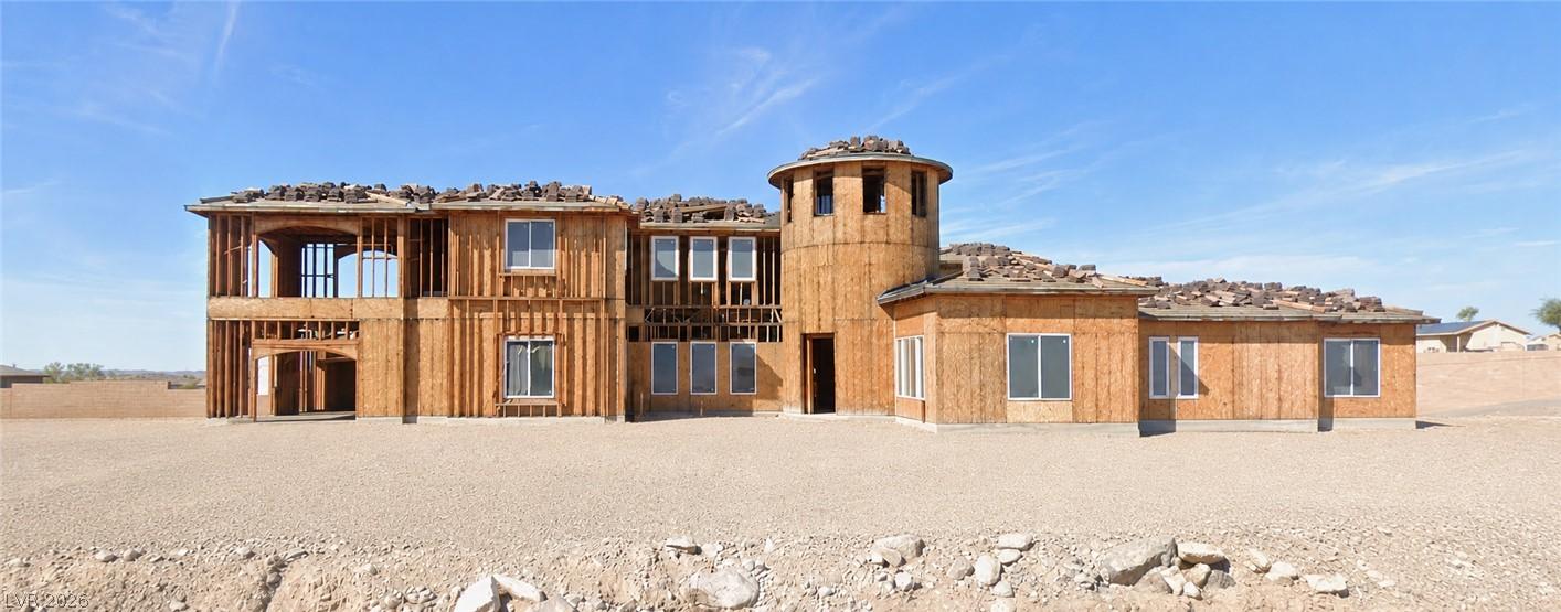 Image 1: A new construction with a distinctive turret desig