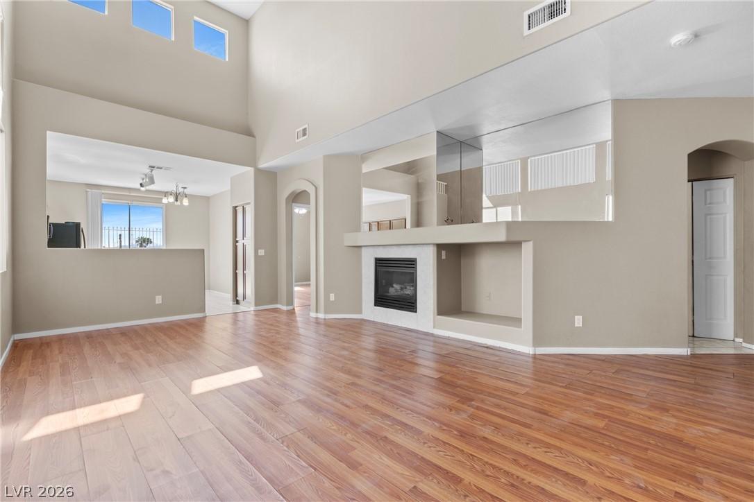 Image 4: Virtually staged. A spacious great room features s