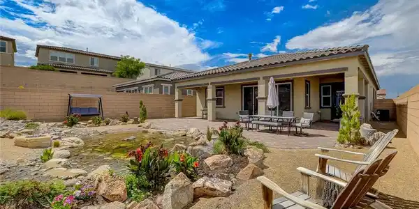 Image 2: Backyard has mountain view , water feature