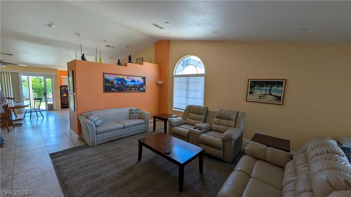 Image 3: Natural light filters through an arched window, il
