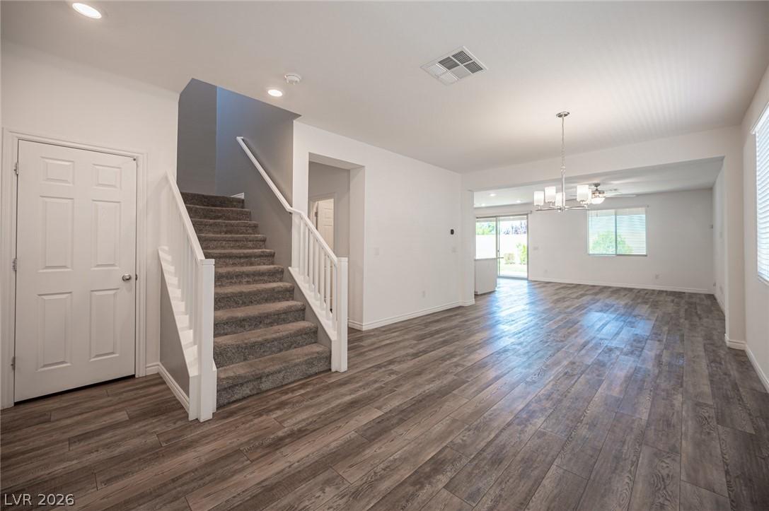 Image 4: Natural light illuminates this spacious living are