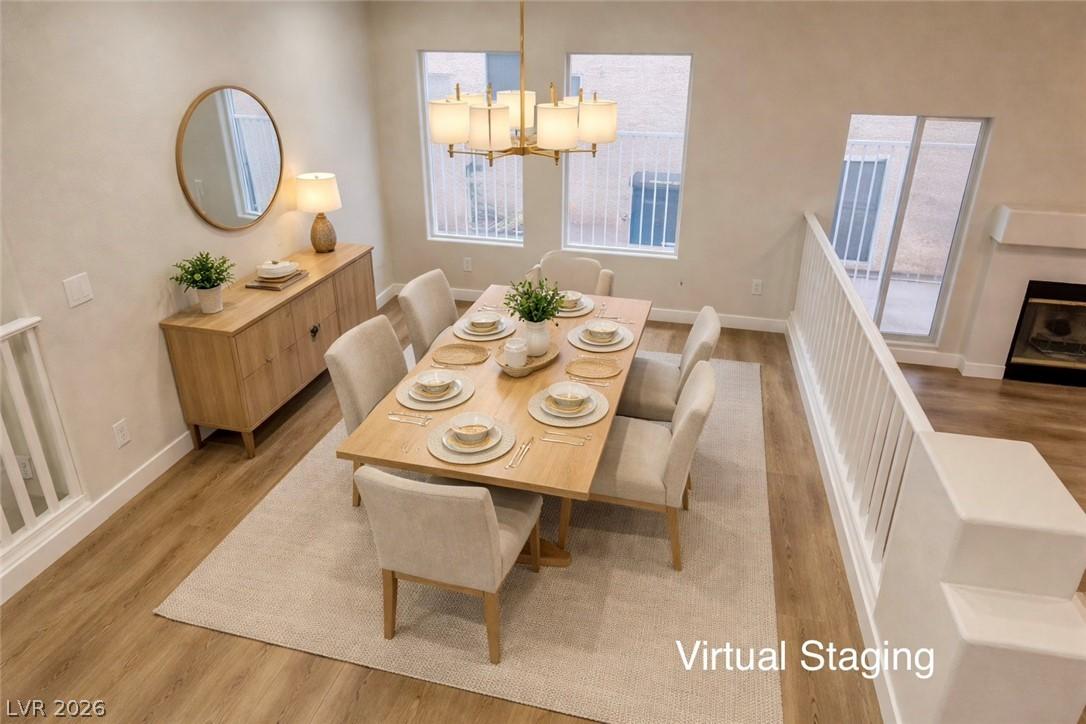 Image 4: Virtual Staging: Dining area featuring light wood-