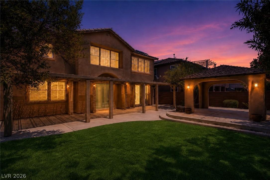 Image 2: This captivating outdoor area offers a spacious la