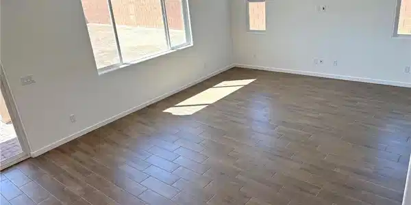 Image 4: Great  room featuring baseboards and porcelain til