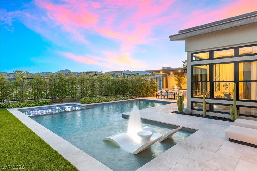 Image 2: This impeccably designed private backyard oasis of