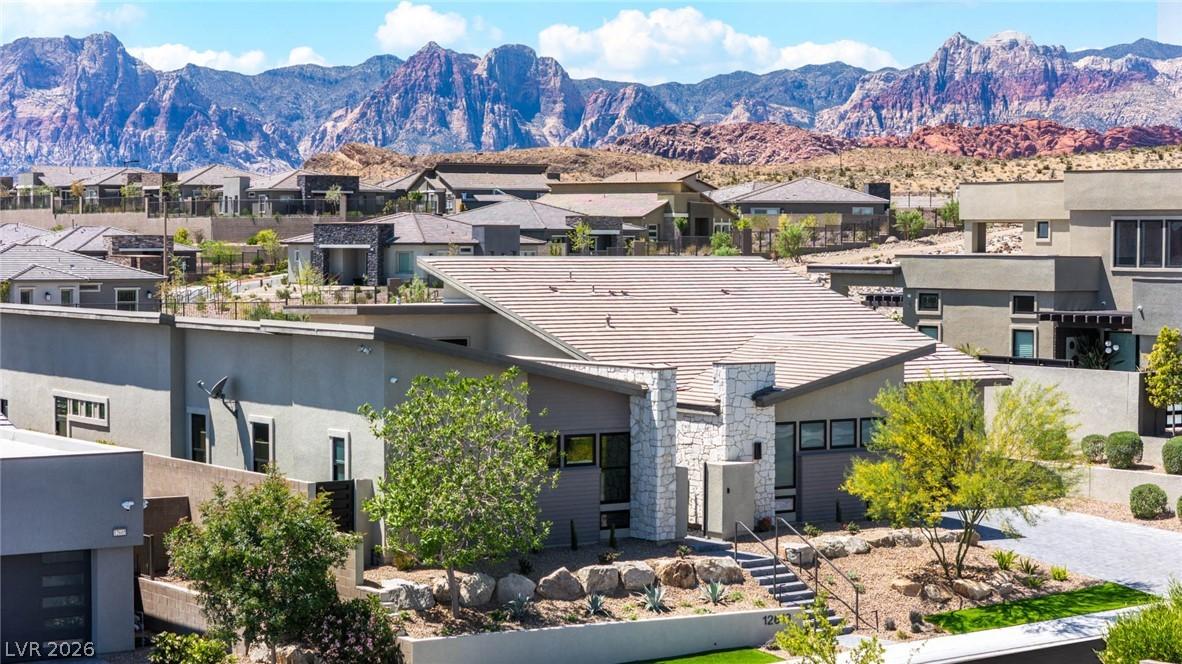 Image 4: This exquisite home offers unparalleled mountain v
